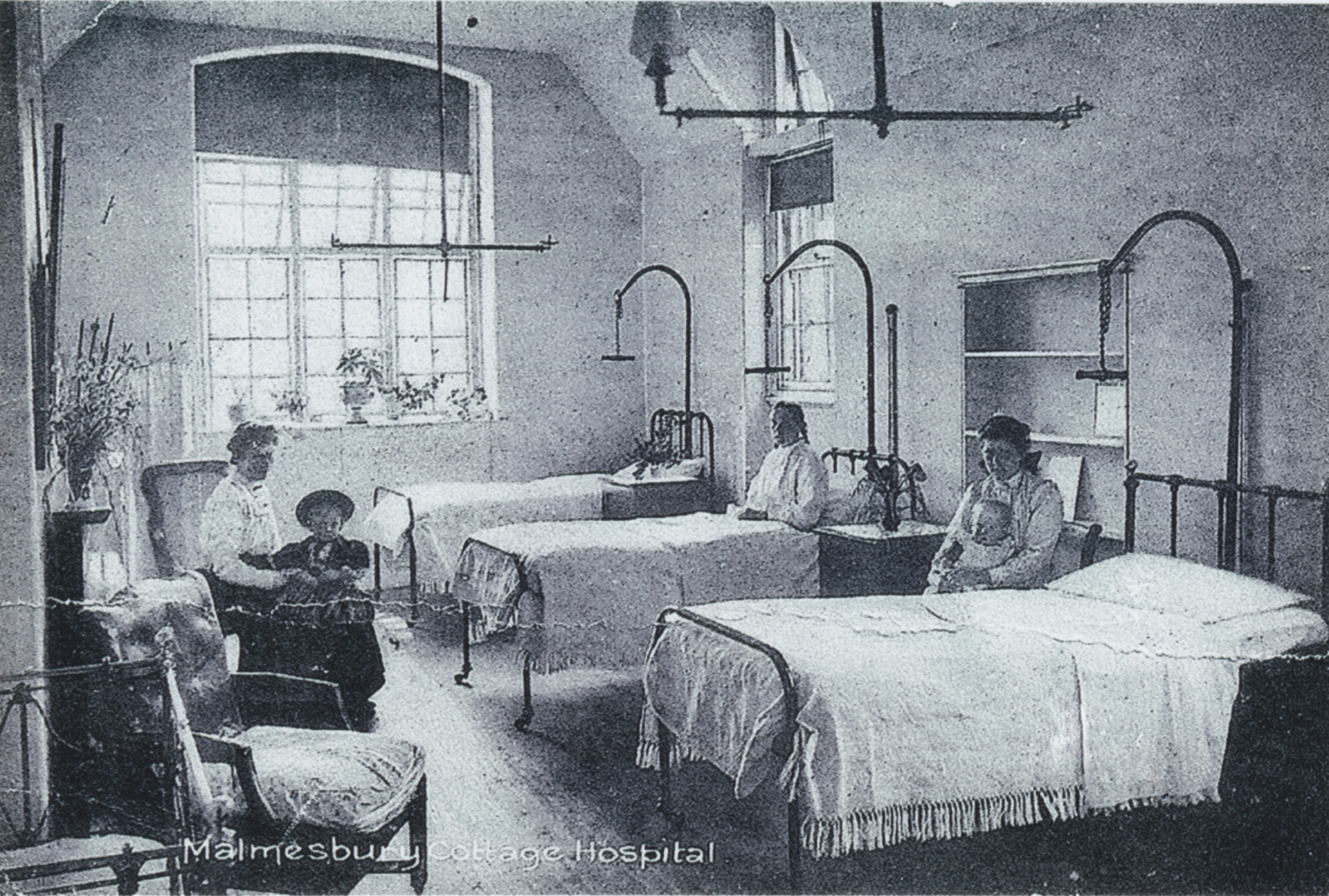 A photograph of a ward at Malmesbury Cottage Hospital.